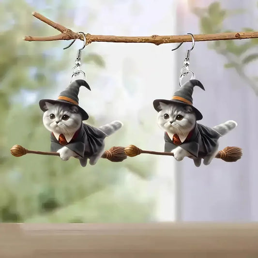 Set X2 Caravanas Con Forma De Gato Volador Brujita Acrilico